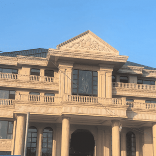 安徽黄金麻别墅外墙干挂石材效果示例